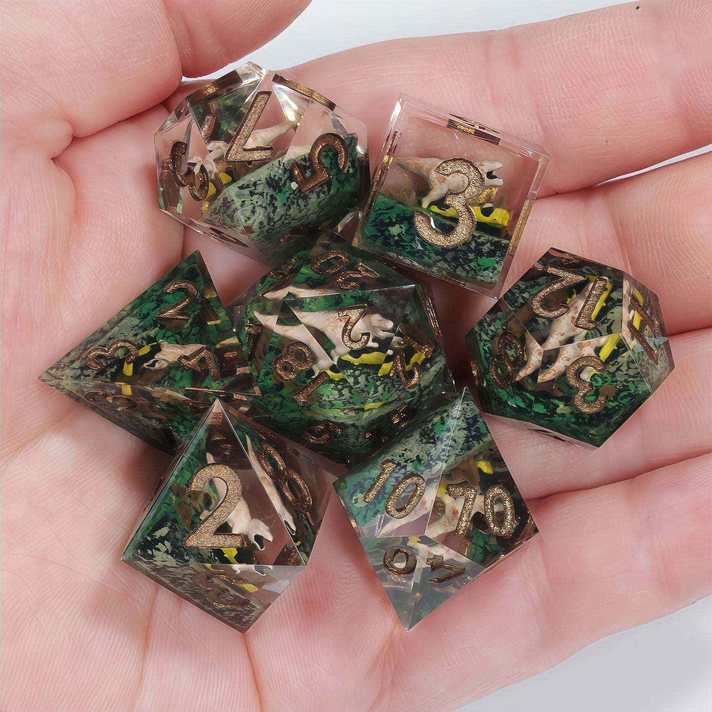 Prehistoric Realm - Hand-Painted Dinosaur Crystal Clear Resin DND Dice Set | 7-Piece Polyhedral Dice with 3D Printed Terrain Base for TTRPG Roleplaying